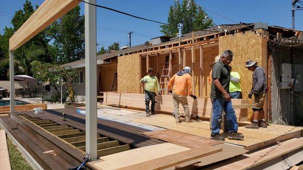 Simon and his crew setting a 24" glulam beam.