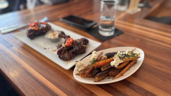 Duck wings with a carrots and goat cheese appetizer!! Fantastic blueberry glaze on the duck wings!!