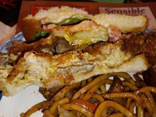 Side View of St. Paul Sandwich - House Combo Egg Foo Young Patty, lettuce, tomato, mayo on white bread