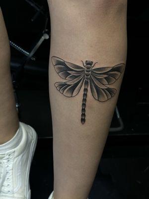 Dragonfly tattoo by Moses