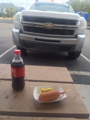 Stopping for a coke and a corn dog.