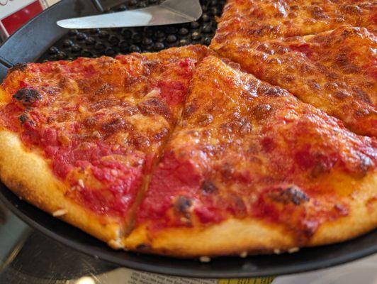 Simple Cheese pizza.  Delicious sourdough crust, not floppy, nice undercarriage.  Simple and delicious.