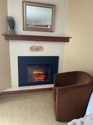 Electric fireplace in room