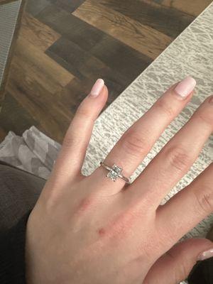 Radiant cut solitaire engagement ring