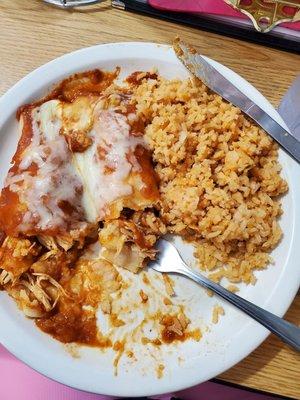 I could not help myself ,before taking a picture. The best enchiladas I have ever had. The rice is amazing.