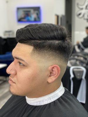 Mid bald fade with combover