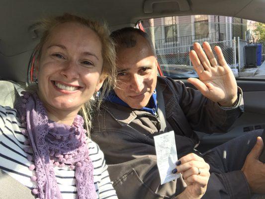 Here I am with Joseph, holding a temporarily driving license after the road test :-)