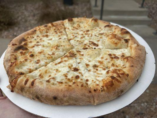 White Pizza - Garlic, rosemary, and mozzarella cheese!