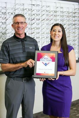 Dr. Adams and Dr. Woo receiving "Top Ten Eye Care Practices in the Nation" Award