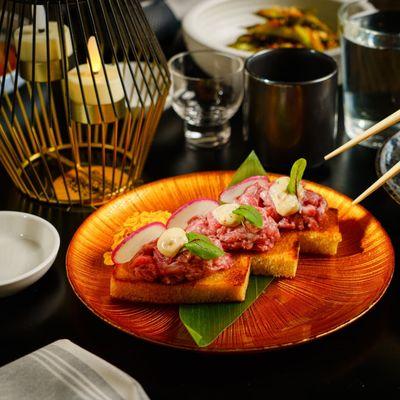 Beef Tartare - wagyu beef on toasted brioche with miso butter.