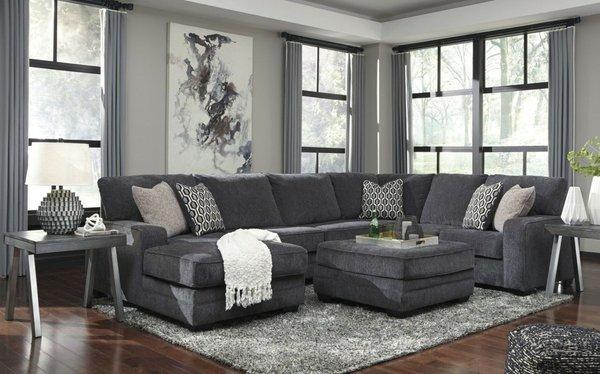 this chic style sectional comes in charcoal grey upholstered fabric, with the option of left or right chaise to suit the living room.