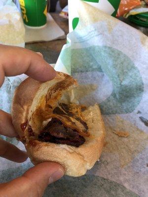 A picture is worth a thousand words. The new pit-smoked brisket sandwich. Don't come hungry.