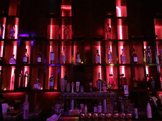 The sexy red lighting for the bar