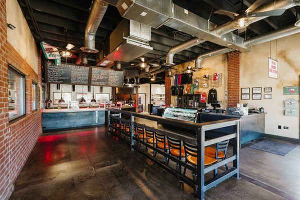 Our front lobby area where you can watch our crew prepare the perfect platter, place & pick up orders and shop all our deli options.