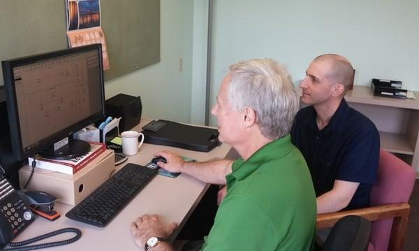 Teaching a client to use QuickBooks.