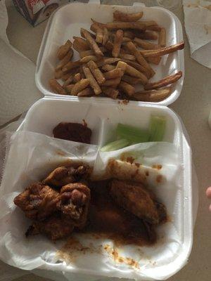 Chicken wings and fries