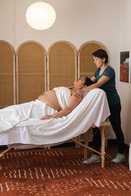 Prenatal Massage with Alissa. She offers massage in a reclined or side lying position for a pregnant clients. Postpartum massage with baby.