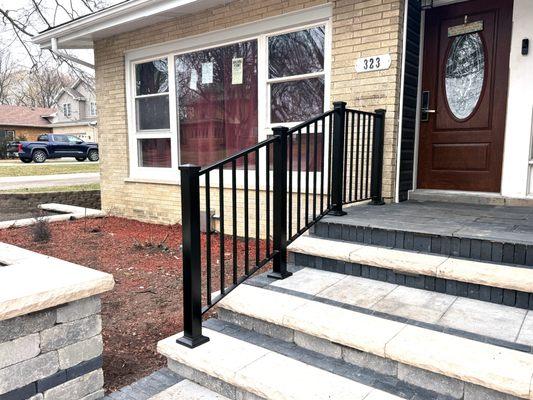 Exterior front porch railing with large posts and post caps