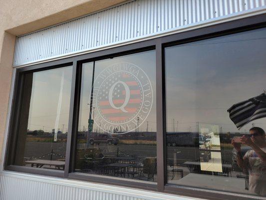 The Whole bar looks like this.  They put the Q Anon flag right in the front window.