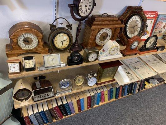 fun clock and phone collectibles as well as many vintage books