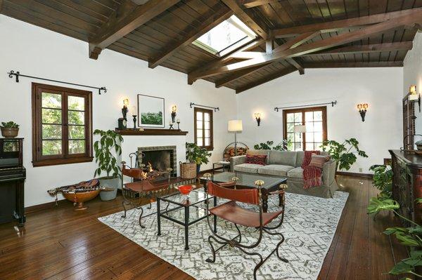 Listed + Sold in Northwest Glendale | Spanish Colonial Revival with large living room with pitched wood truss ceilings