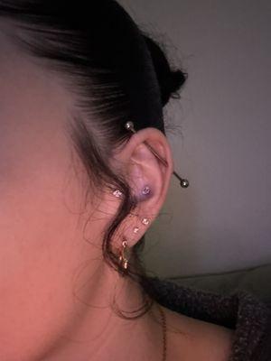 Industrial and conch piercing (new) Tragus done out of state, lobe piercing done with a gun