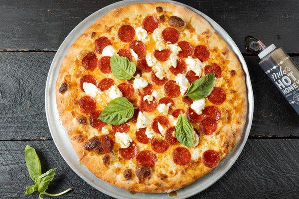 Mama Sweetie Pie! 
 White pie with fresh basil, ricotta cheese, pepperoni, hot honey