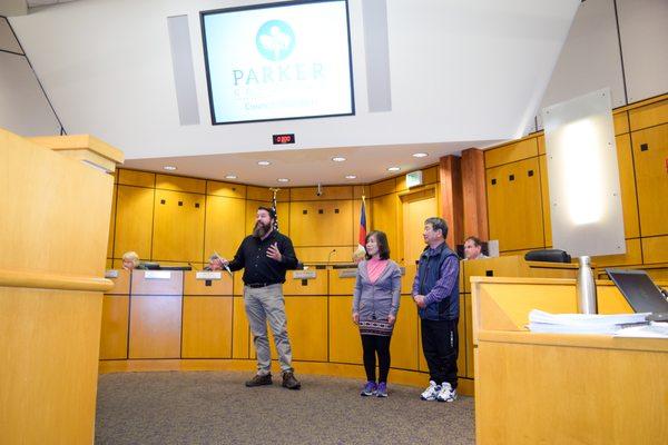 Esther and John being recognized by the Town of Parker for their 25 years in business