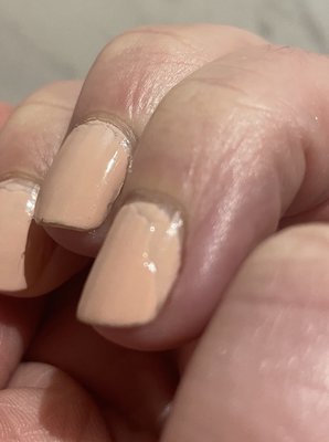 Poor paint job on all nails.