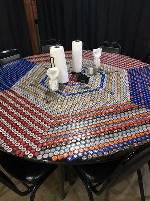 Unique bottle top table