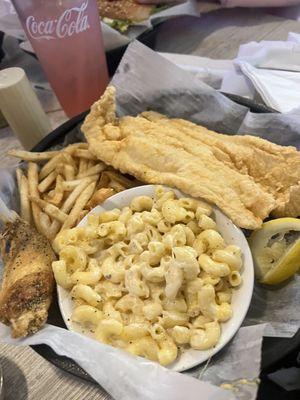 Fish and chips with mac & cheese, and a pink lemonade