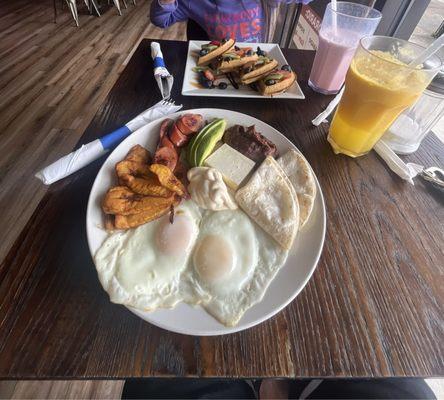 Big breakfast & waffles with fruits.