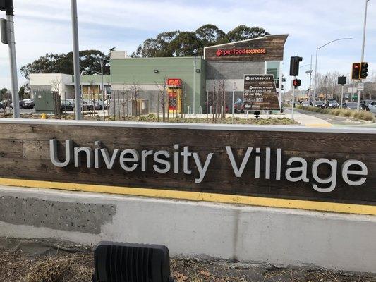 Sign leading to the University Village in Albany.