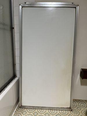 Hi Melissa, Enclosed please find the back side of my shower door.
 chungsam@gmail.com