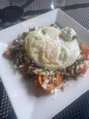 Chilaquiles Poblanos with chorizo is so good!