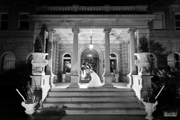 Bride and Groom on the front steps of Semple Mansion