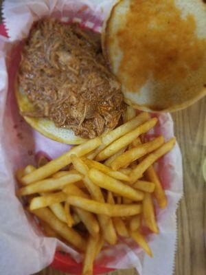 Pulled pork sandwich with fries