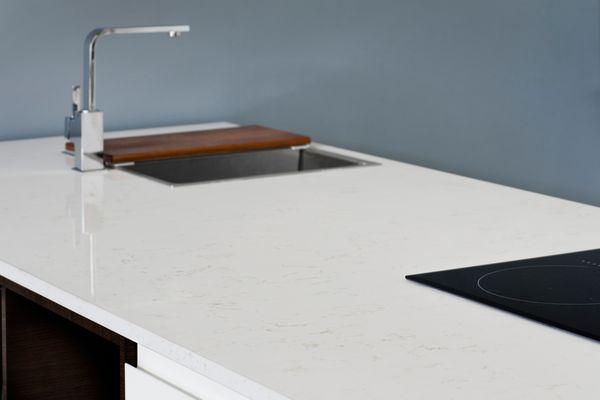 Inspired by Italy's famous Carrara marble, Vicostone Carrara is a unique design with warm gray veins on a luxurious marbled stone.