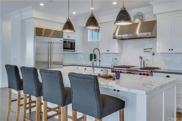 Kitchen with Wolf stove and SubZero fridge