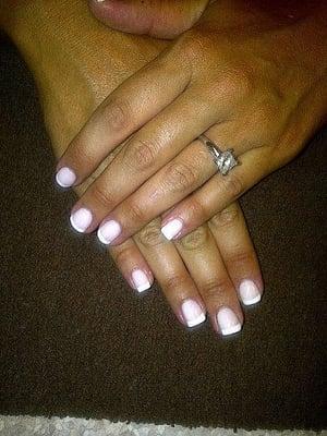 A white-on-white shellac french manicure at BellAmore Salon and Spa.