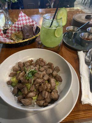 Chicharron on a bed of guacamole