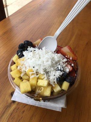 Açaí Fruit Bowl With Strawberries, Blueberries & Pineapples... Granola & Coconut shaving with a drizzle of honey.