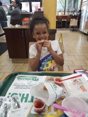 Another generation enjoying Nathan's crinkle fries!