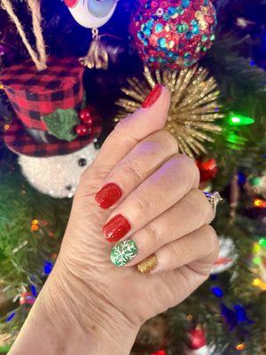 Thank you Ms. Emily for my beautiful, glitzy Christmas nails. This salon is under new ownership and Emily has done my nails for years.