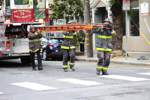 SFFD members of truck 5 bringing out the long bois