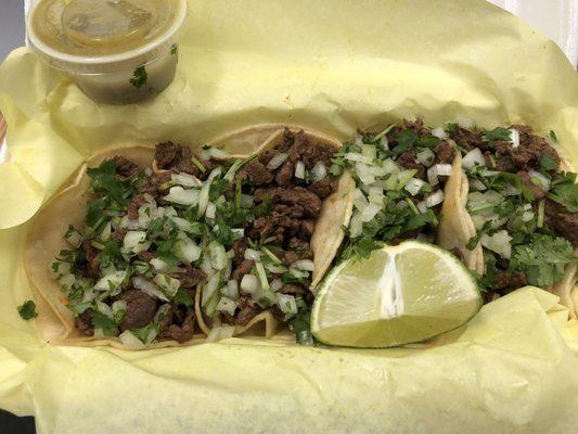 Carne asada street tacos with a lime and green (I call it gringo!) salsa.