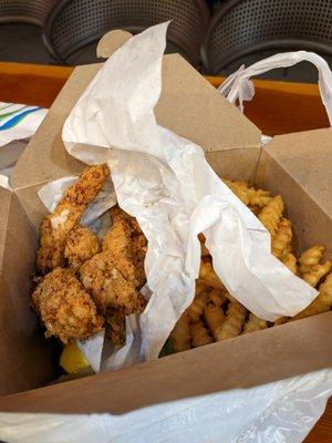 House-made chicken tenders and crinkle fries