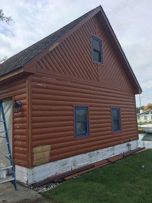 Cedar Sided garage with paint, before