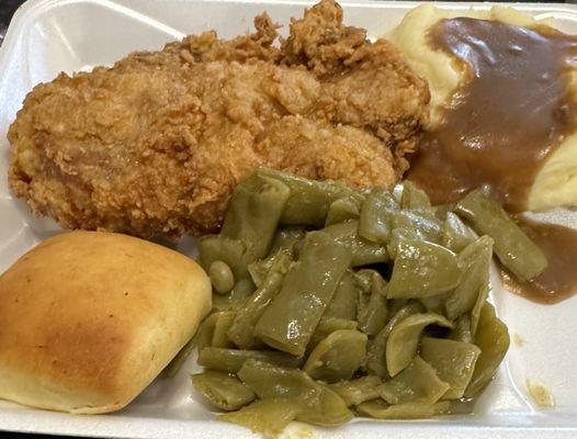 Great, home-cooked meat & 1, 2, or 3 sides (Fried Pork Chop pictured). Menu varies daily. Quick & delicious.