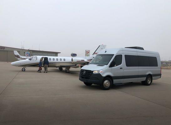 Silver Mercedes Sprinter Party Bus @ Private Airport Pickup